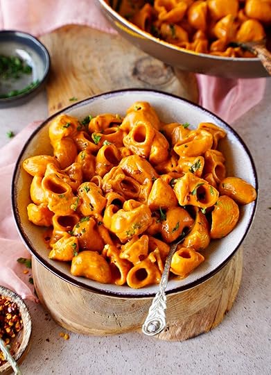 roasted red pepper pasta in bowl with spoon