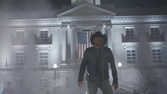 Jason Aldean sings in front of the Maury County courthouse with an American flag in his music video for