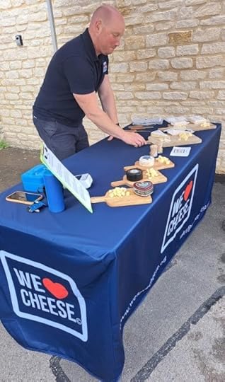 photo of cheese stall with sign saying We Heart Cheese