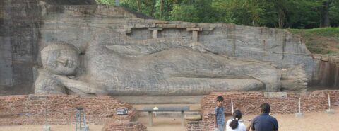 A stone carving of Buddha to illustrate the blog post 