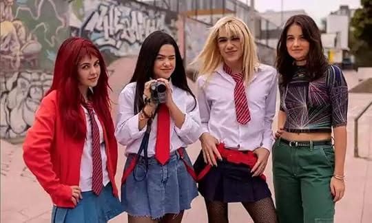 A scene from season two of De Volta Aos 15 where three of the characters (Camila, Anita and Carol) dress up in Rebelde cosplay while Anita's sister Luiza encourages them.