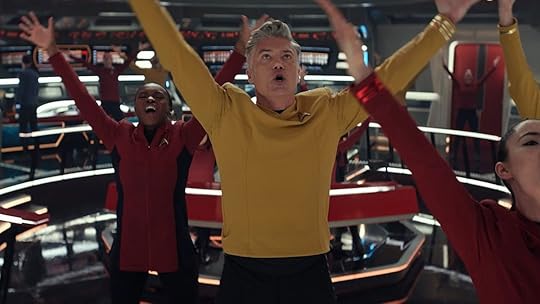 Captain Pike leads the crew of the Enterprise in an ensemble dance for the Star Trek: Strange New Worlds musical episode, one of the best TV and movie moments of 2023 according to Nerdist