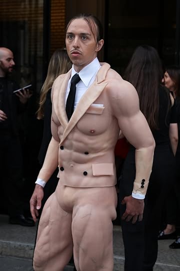 Tommy Cash wearing suit that makes him look naked.