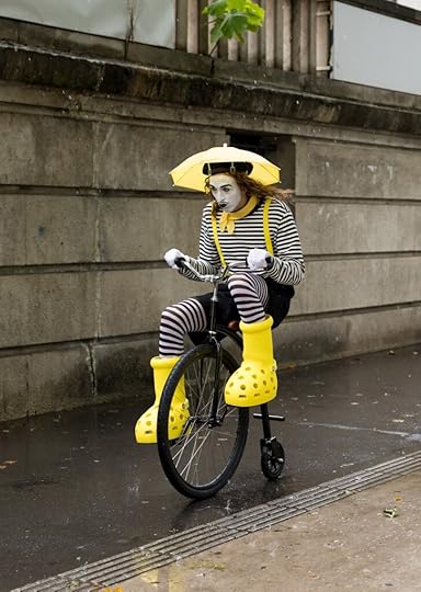 Tommy Cash on old fashioned bike dressed as a mime.