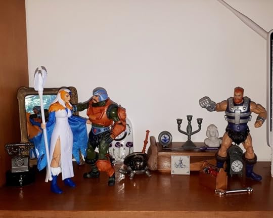 Duncan talks to the Sorceress, while Malcolm unpacks the tools.