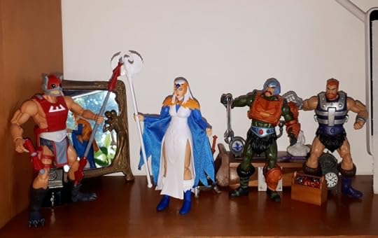 The Sorceress confronts Zodac, while Duncan and Malcolm look on.