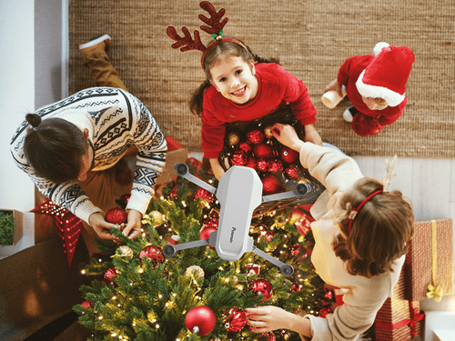 Atom SE hovering over a christmas tree