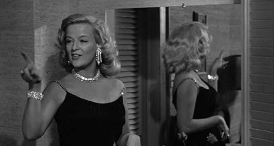 Kim Stanley before a mirror in 