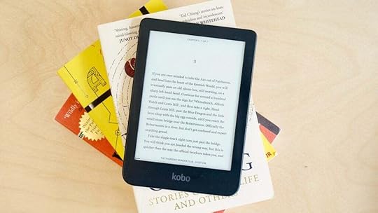 Kobo Clara 2E on a stack of books
