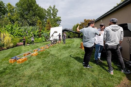 Setting up a scene in the botanical gardens