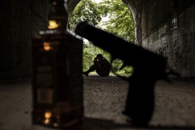 Military officials recommend reaching out to people who may be having difficulties and then helping them get to resources, such as the suicide helpline, if they are at risk for suicide. Photo illustration by Joshua J. Seybert, courtesy of the U.S. Air Force.