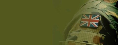 A close up of the Union Jack flag on the shoulder of a British Army soldier, fading out into an army green background to illustrate the blog post 