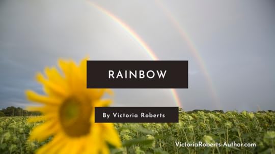 A rainbow over a sunflower field 