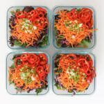 green onions added to meal prep salads.
