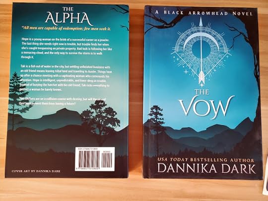 Front and back covers. Front features tree silhouette with blue landscape and a bow and arrow image. Back cover is a different book with mountains and tree silhouettes with green skyline and blurb