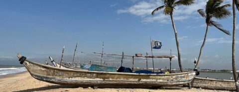 Photo of a fishing boat on the shore off the coast of West Africa - photo taken by Robert Paarlbeg, author of the blog post 