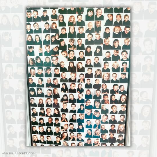 photo of a poster with hundreds of faces of people dressed in a black tshirt, photographed from the waist up. Their clothing and posture was the same. They all had Down syndrome.