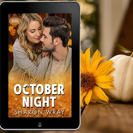 couple hugging in a fall setting