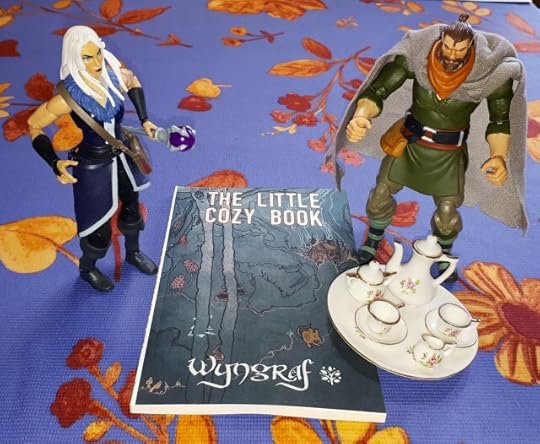 Duncan and Evil-Lyn with The Little Cozy Book