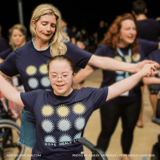 Katherine and Penny dance at a dance party