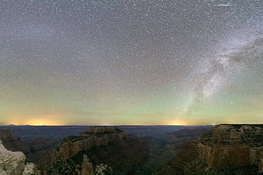 Milky Way illumines an opalescent, dusk night sky with views to dramatic rock formations from Cape Royal Trail at the North Rim of Grand Canyon National Park one of the best national parks for stargazing 