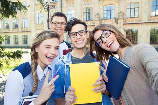 Group of college friends standing in front of their university.