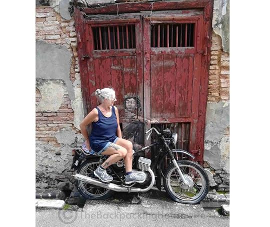 Backpacking Housewife Boy on a Motorbike by Ernest Zacharevic from 2012