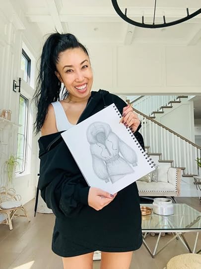 cassey ho holding sketch of popflex game day dress hoodie dress