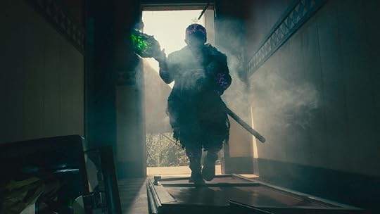 The titular hideously deformed hero (Peter Dinklage) breaks down a door in The Toxic Avenger remake.
