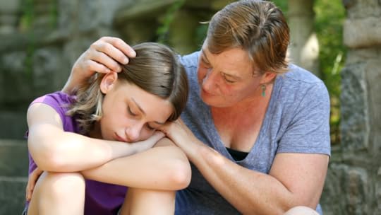Understanding Autistic BurnoutMother comforting her teenage daughter