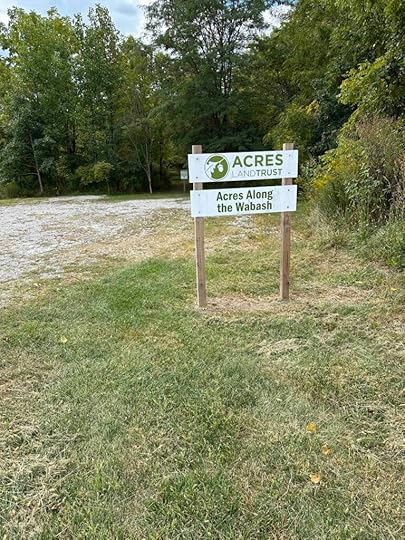 sign at entrance of Acres Land Trust site