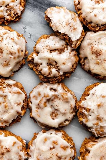 overhead photo of pumpkin oatmeal cookies with icing.