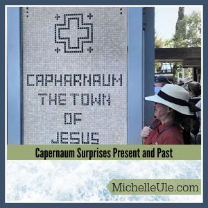 Red shirted woman looking at sign 