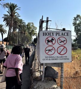 Warning sign--this is a holy place, behave yourself.