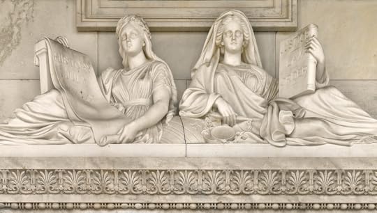 Justice and History marble sculpture in U.S. Capitol features two draped female figures reclining against a globe. Justice holds a book inscribed 