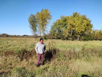 Jessika Greendeer on site of new farmland.