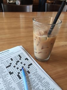 Crossword puzzle with a drink