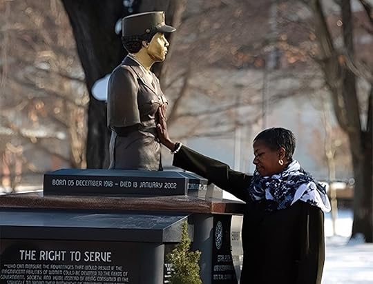 A women's equality day button with a red, white and blue background.
