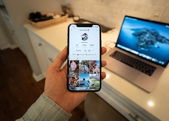 tiktoker showing his tiktok account's likes and followers.