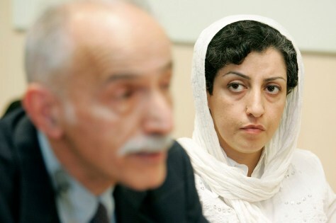 Narges Mohammadi, right, from the center for Human Rights Defenders, listens to Karim Lahidji, president of the Iranian league for the Defence of Human Rights, during a press conference on the Assessment of the Human Rights Situation in Iran, at the UN headquarters in Geneva, Switzerland, on June 9, 2008. 