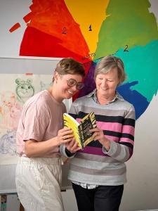 artist and author read book