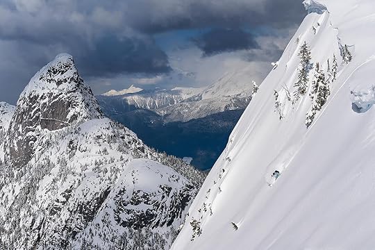 skier on steep mountain