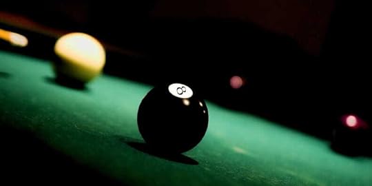 Black and White Ball on a Pool Table