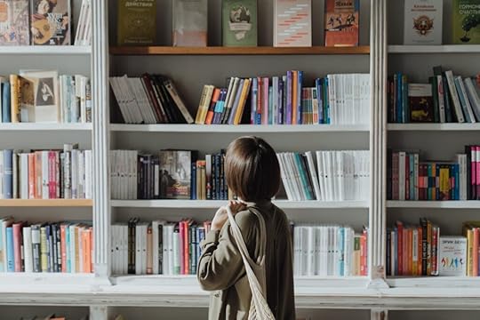 A woman looking for a book to review.