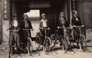 Missionary girls on bikes at the Beijing Bible Training Institute