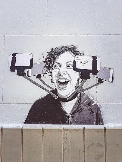 man in black leather jacket drawing