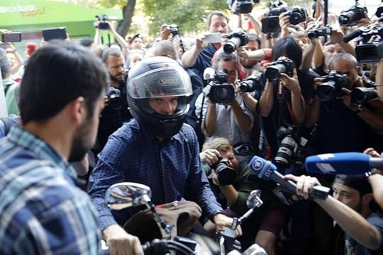 Yanis Varoufakis, pictured after his resignation as Greek finance minister in 2015, says his father introduced him to capitalism at an early age. AP