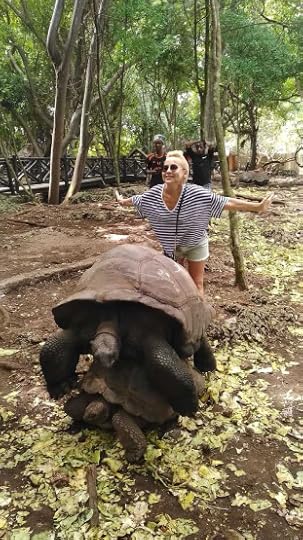 Posing near two turtles on Changuu - Prison Island near Zanzibar, Tanzania.