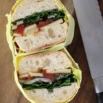 cut sides of English pickle sandwich facing up.