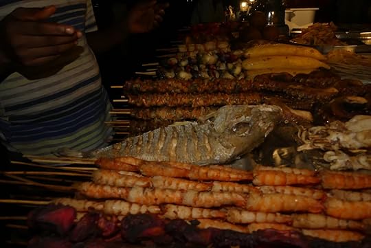 Grilled prawns at a food stall at Forodhani Garden in Stone Town, Zanzibar, Tanzania.